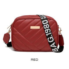 Red quilted handbag with a black strap featuring 'BAG.1980' text on a white background.