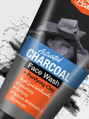 Activated charcoal face wash bottle with label on a textured background