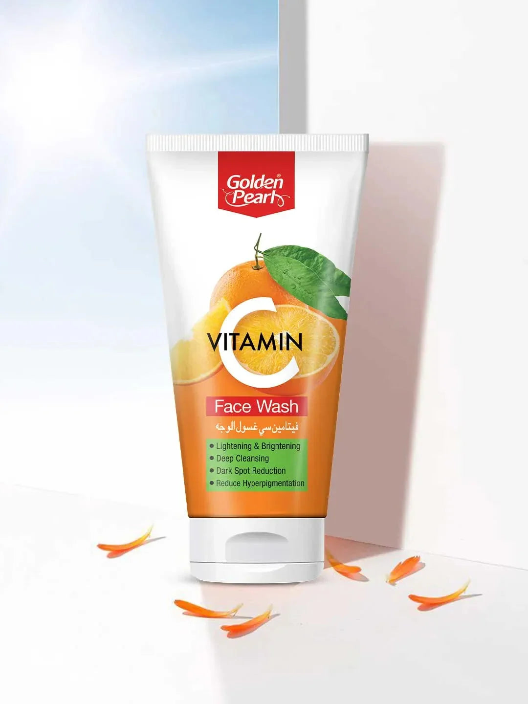 Tube of Golden Pearl Vitamin C Face Wash with orange and green elements on a white background